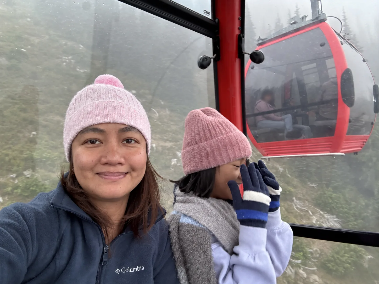 Chai and Thea, the explorers of Seattle and the Pacific Northwest. Chai and Thea exploring the Pacific Northwest by gondola.