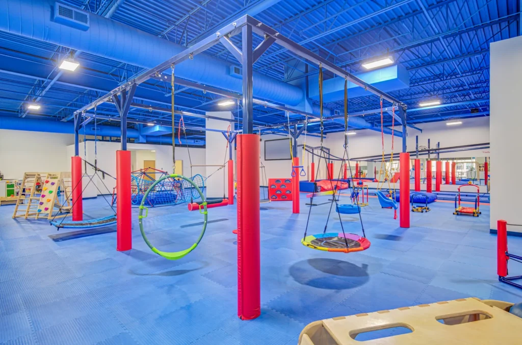 Sensory play equipment inside We Rock the Spectrum Kid's Gym.