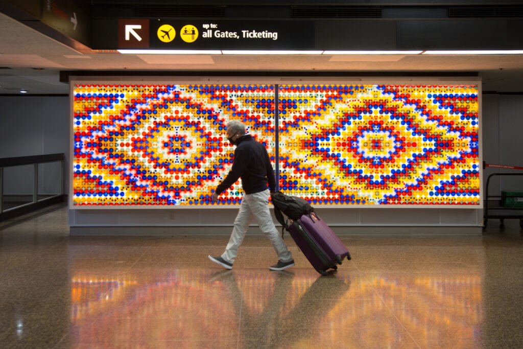 "Eyes on the World": A Light Box at Baggage Claim, see this on your next SeaTac Airport layover