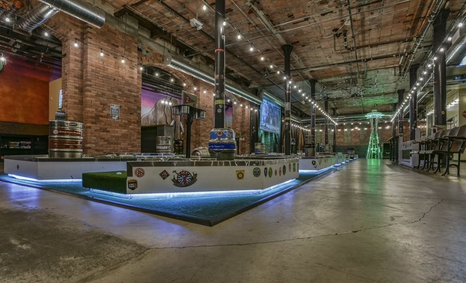 Spending after-work hours at Flatstick Pub with friends is one of the best rainy day activities in Seattle. 